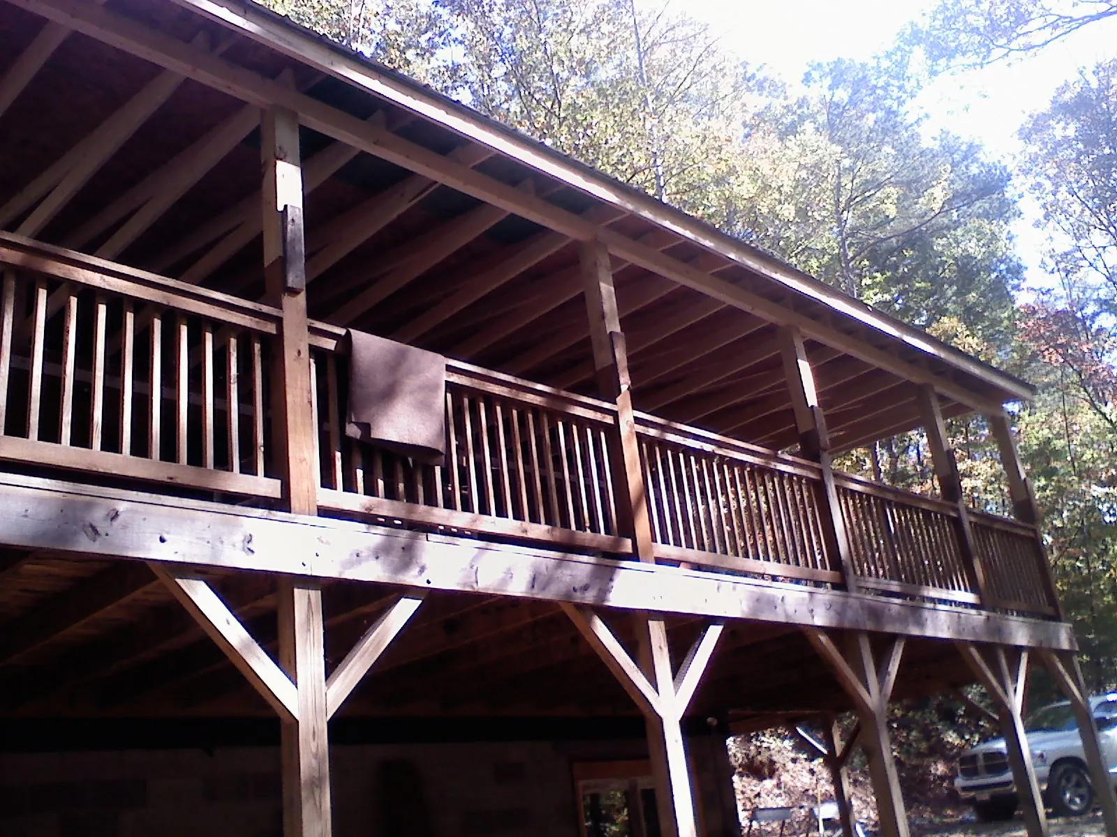 Timber framing under a new elevated porch and deck — Roof Leak Repair in Drake by Roofing Brothers